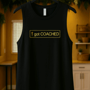 Black tank top with "I got COACHED" text.