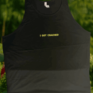 Black tank top with "I Got Coached" text.