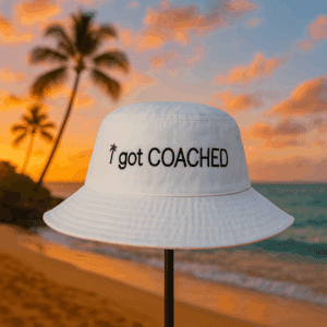 Bucket hat with "I got COACHED" text.